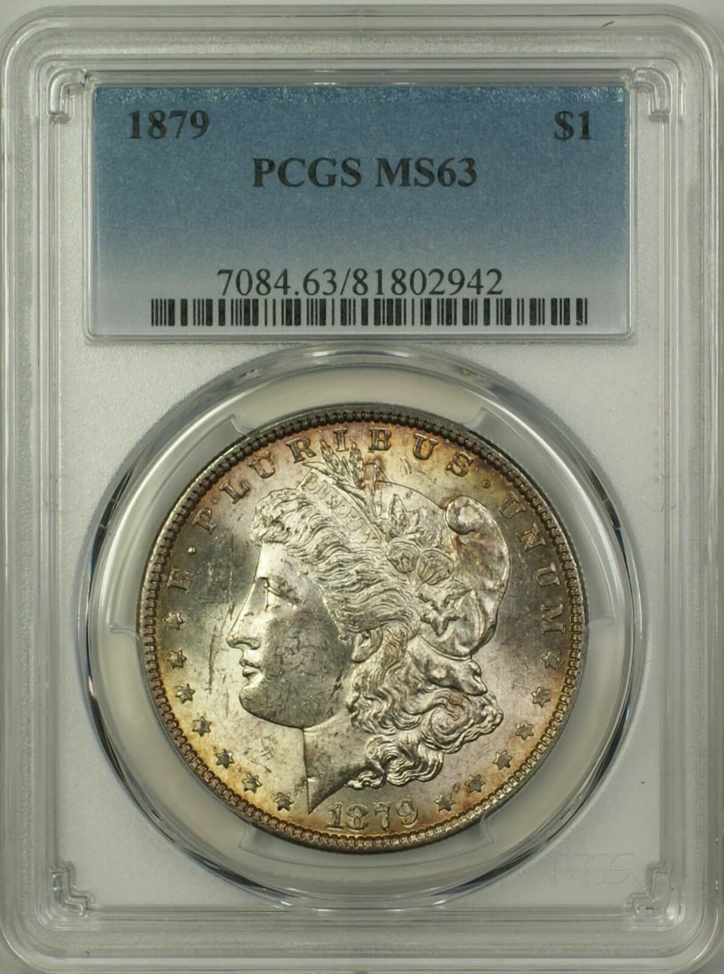PCGS MS-63 1879 Morgan Silver Dollar San Francisco Toned: PCGS MS-63 1879 Morgan Silver Dollar San Francisco Toned This 1879 Morgan Silver Dollar $1 coin is certified by PCGS with a grade of MS-63. The coin features attractive toning and is uncirculated. Min