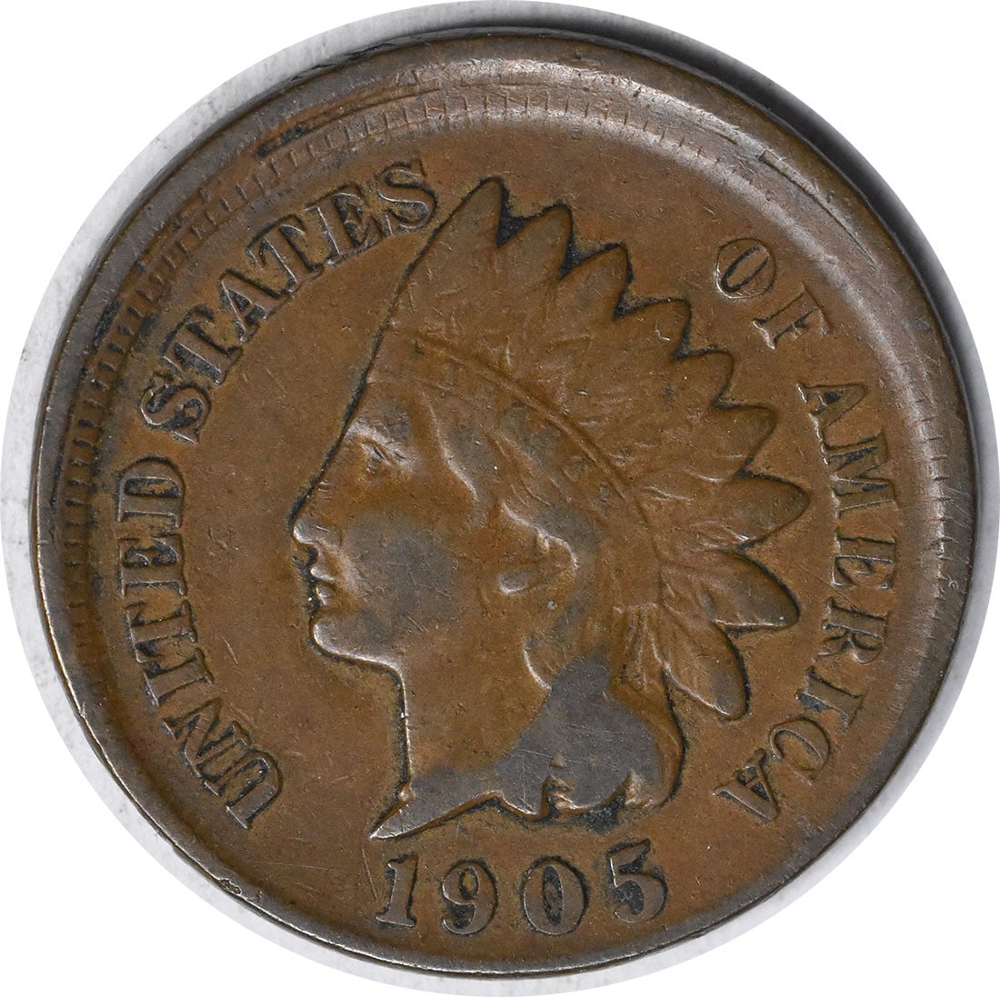 1905 Indian Head Copper Small Cent 5% Off Center F Uncertified: 1905 Indian Head Copper Small Cent 5% Off Center F Uncertified This 1905 Indian Head Cent features a 5% off-center strike, adding a unique error to its appeal. The coin is circulated, graded as Fine (