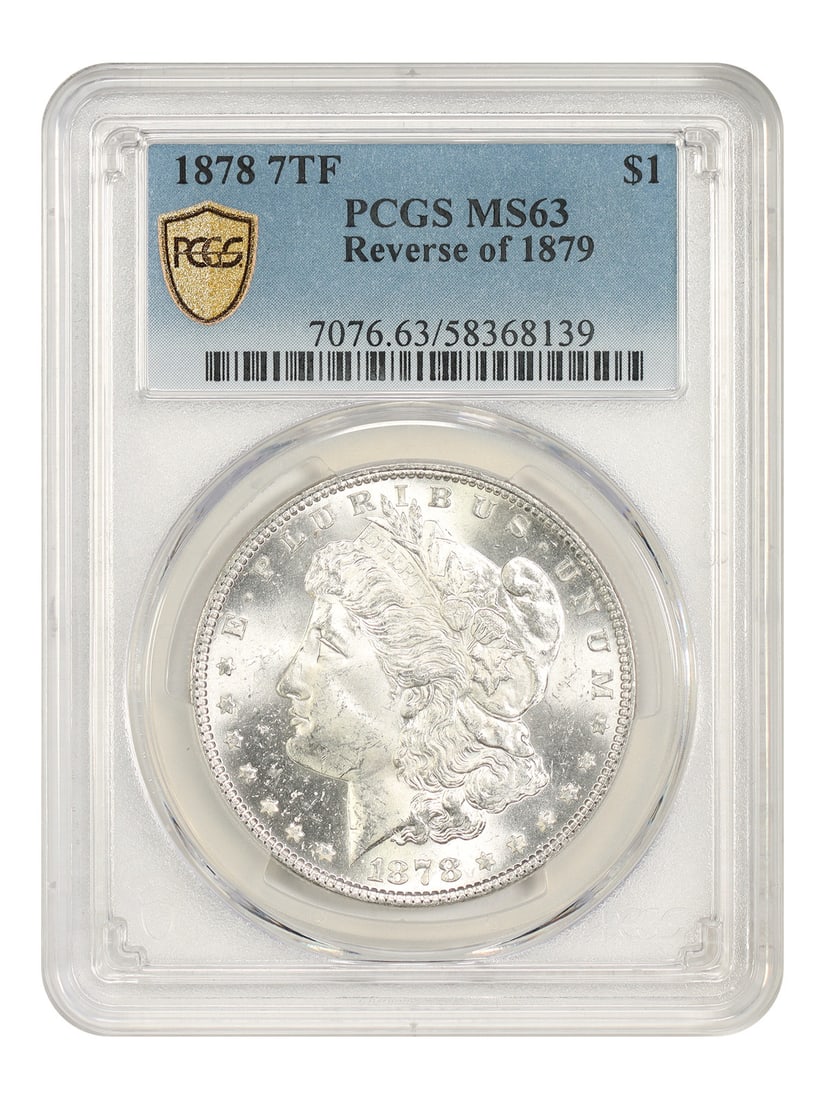 Morgan Dollar 1878 7TF Reverse of 1879 PCGS MS63: Morgan Dollar 1878 7TF Reverse of 1879 PCGS MS63 An 1878 Morgan Dollar $1 graded PCGS MS63. This Philadelphia-minted coin is an uncirculated example of the 1878 7TF Reverse of 1879 variety and is note