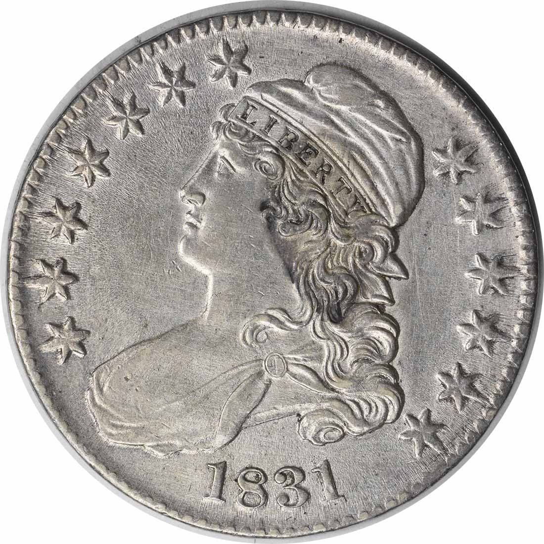 1831 Bust Half Dollar AU John Reich Design Uncertified: 1831 Bust Half Dollar AU John Reich Design Uncertified This 1831 Bust Half Dollar is a notable piece of American numismatic history. It features a design by John Reich and is composed of 89.2% silver 