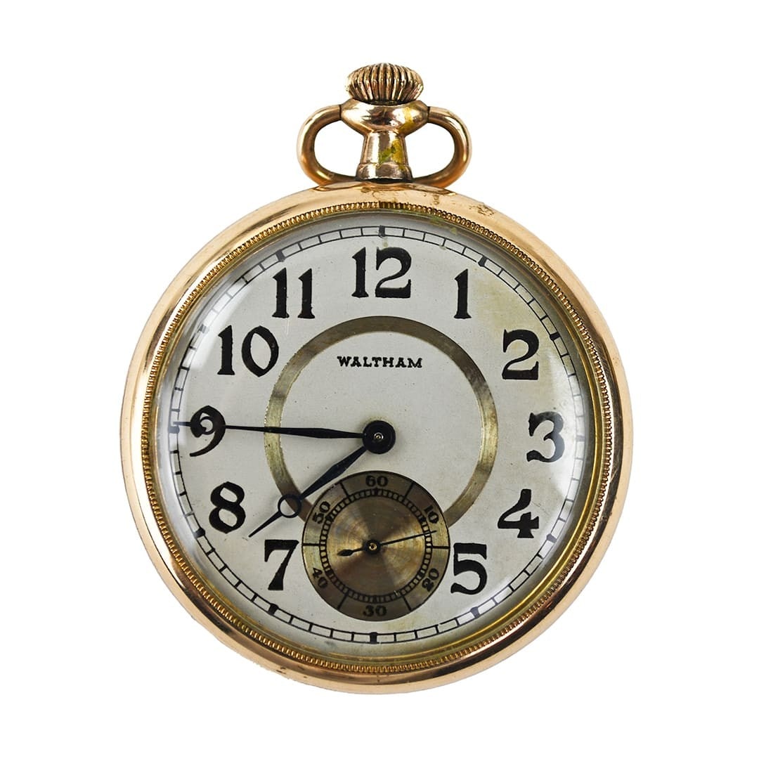Waltham 12 Size Gold Filled Open Face Pocket Watch: Waltham 12 Size Gold Filled Open Face Pocket Watch This Waltham gold filled pocket watch, manufactured in 1914, features an open face design and a 12-hour ivory dial. It is equipped with a 15-jewel da