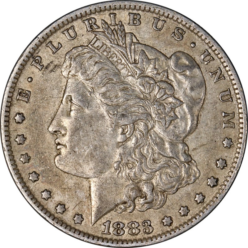 Circulated 1883-O Morgan Dollar Silver Coin from New Orleans Mint: Circulated 1883-O Morgan Dollar Silver Coin from New Orleans Mint This 1883-O Morgan Silver Dollar is a nicely circulated coin, chosen for its appealing color and attractive surfaces. Free of distract