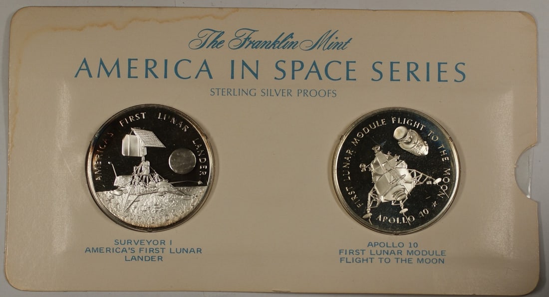 Franklin Mint America in Space sterling silver proof medal pair: Franklin Mint America in Space sterling silver proof medal pair This item consists of America in Space Series sterling silver proof medals featuring Surveyor I and Apollo X. These medals were produced