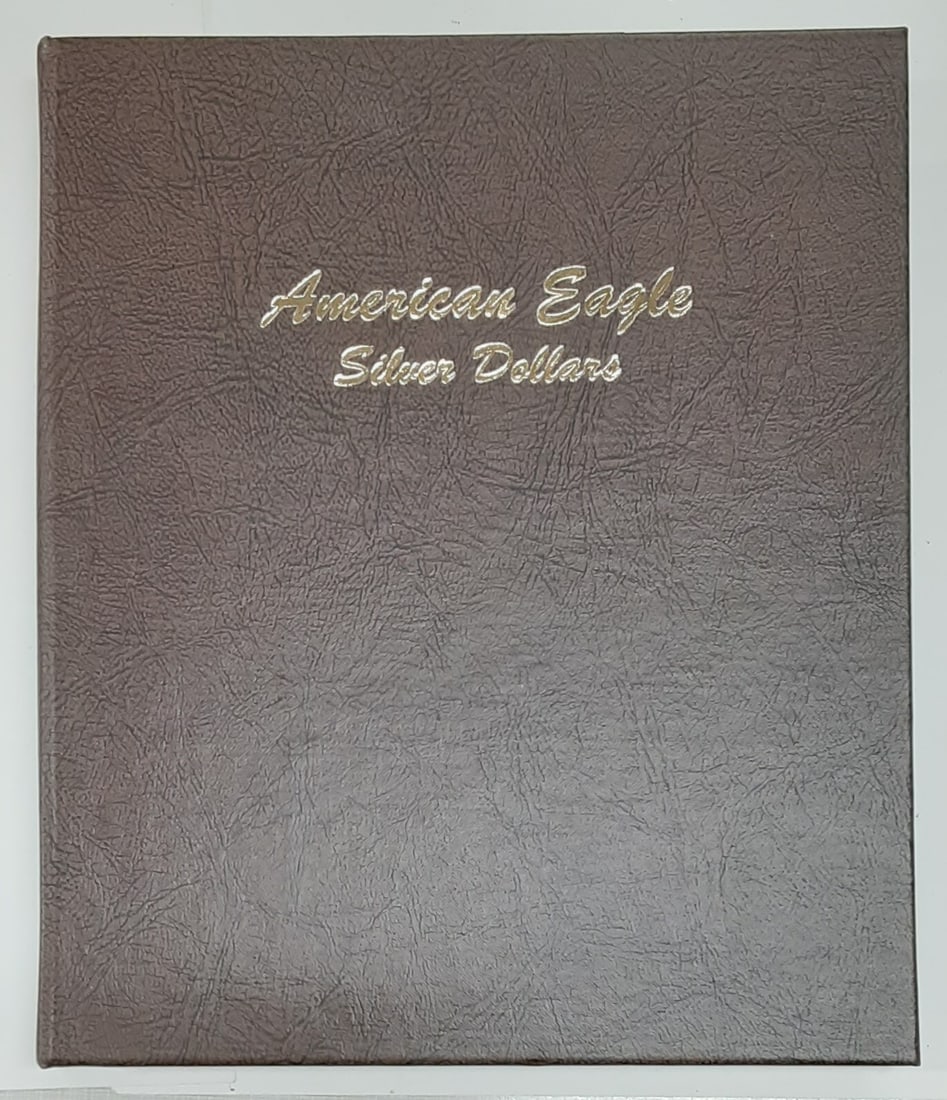 Set of 36 Uncirculated American Silver Eagles 1986-2021 in Dansco Album: Set of 36 Uncirculated American Silver Eagles 1986-2021 in Dansco Album This set includes thirty-six American Silver Eagle coins, each with a denomination of $1 and minted between 1986 and 2021. The c