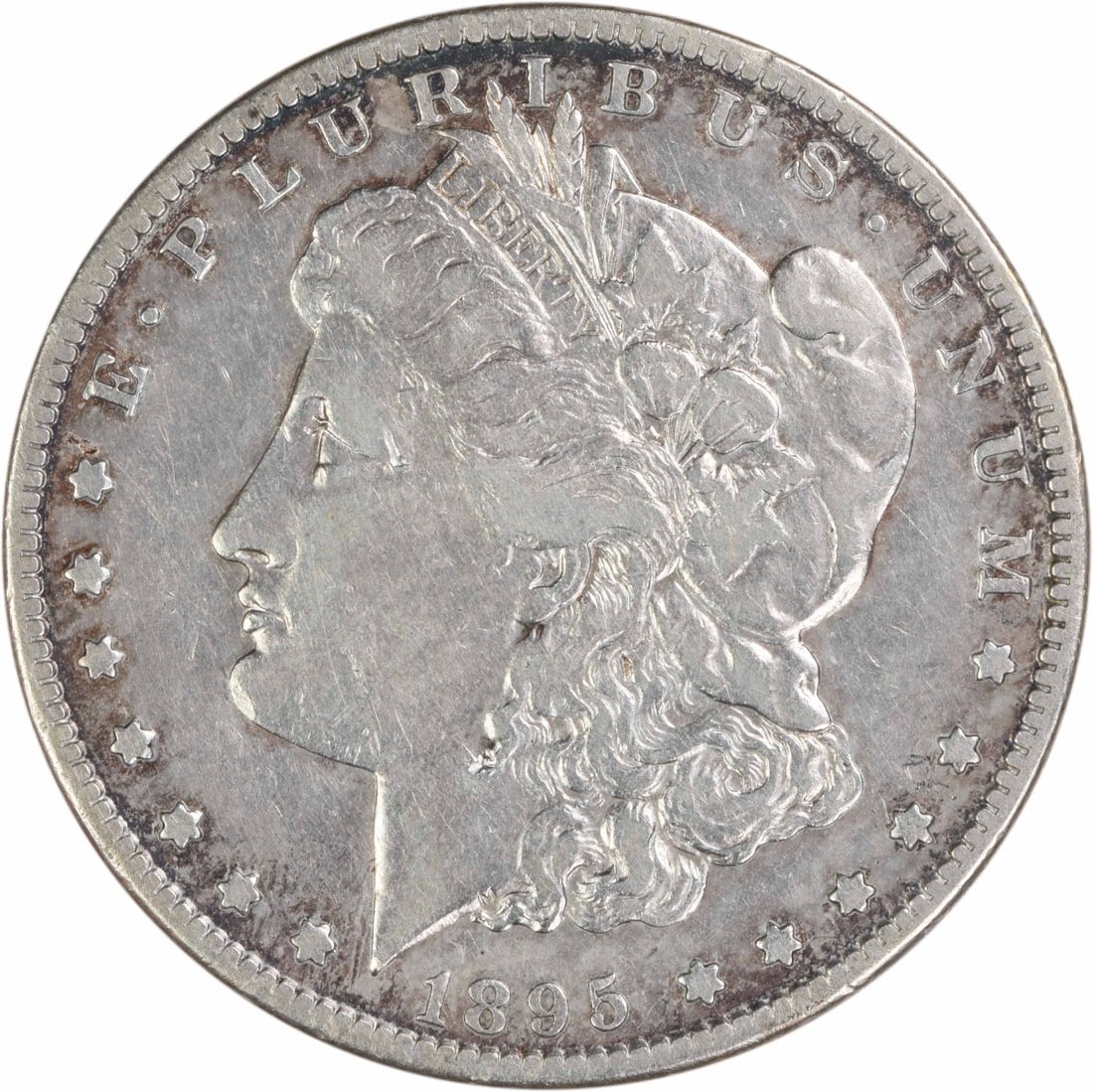 San Francisco 1895 Morgan Dollar 90 Percent Silver VF Uncertified: San Francisco 1895 Morgan Dollar 90 Percent Silver VF Uncertified This 1895-S Morgan Silver Dollar is a circulated coin from the San Francisco Mint. Composed of 90% silver and 10% copper, it features 