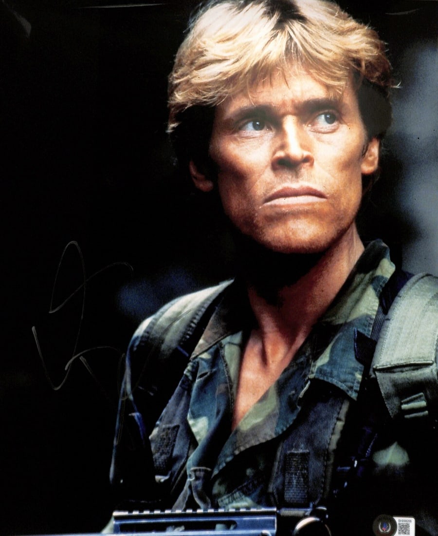Willem Dafoe Signed 11x14 Photo from Platoon BECKETT Certified: Willem Dafoe Signed 11x14 Photo from Platoon BECKETT Certified This is an original 11x14 photograph signed by Willem Dafoe, renowned for his role as "Sergeant Elias" in the acclaimed film Platoon. The