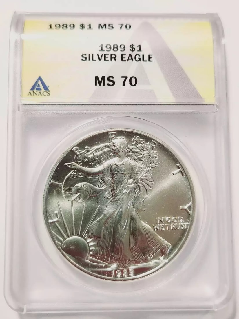 1989 P Silver Eagle Coin ANACS MS 70 Uncirculated: 1989 P Silver Eagle Coin ANACS MS 70 Uncirculated This stunning 1989 P Silver Eagle is certified by ANACS with a perfect grade of MS-70, indicating it is in uncirculated condition. Minted in Philadelp