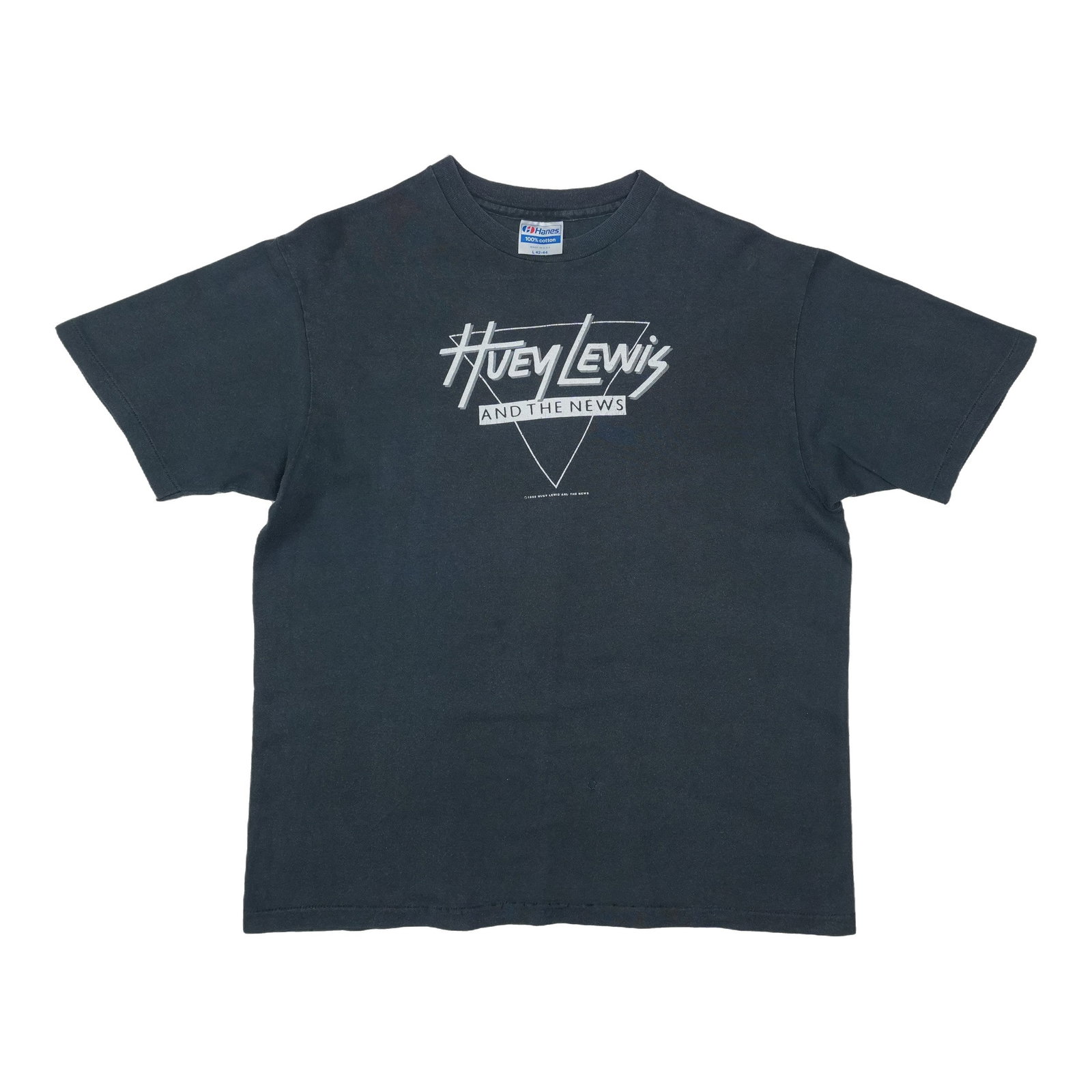 Vintage 1985 Huey Lewis and the News Black Cotton T Shirt Large: Vintage 1985 Huey Lewis and the News Black Cotton T Shirt Large Original vintage 1985 Huey Lewis and the News tour shirt in black. This true vintage shirt is not a modern reproduction and is in good c
