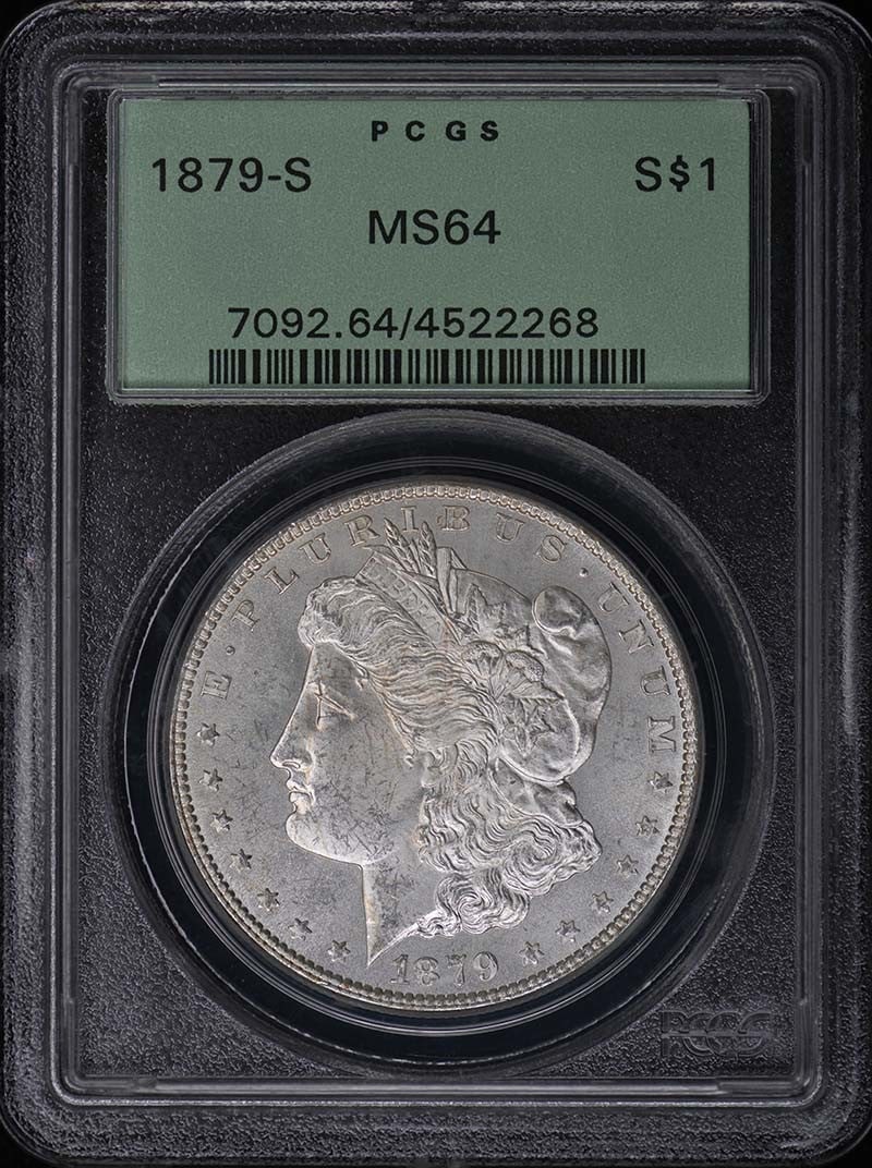 1879-S Morgan Dollar PCGS MS64 San Francisco Mint: 1879-S Morgan Dollar PCGS MS64 San Francisco Mint This is an 1879 Morgan Dollar minted in San Francisco, graded MS64 by PCGS and housed in an old green holder (OGH). It is uncirculated and comes with 