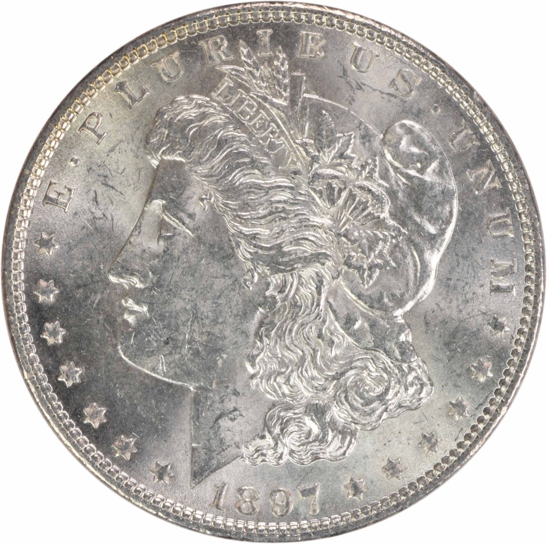 1897 Silver Dollar Morgan Coin Brilliant Uncirculated Uncertified: 1897 Silver Dollar Morgan Coin Brilliant Uncirculated Uncertified This 1897 Morgan Silver Dollar is an uncirculated coin in Brilliant Uncirculated (BU) grade. It is composed of silver, features no min