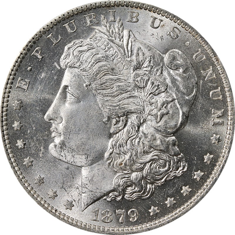 1879 O Mint Morgan Silver Dollar Uncertified Choice BU+ White Luster: 1879 O Mint Morgan Silver Dollar Uncertified Choice BU+ White Luster Original 1879-O Morgan Silver Dollar with Choice BU+ grade. This uncirculated coin features blast white color, strong strike, fanta