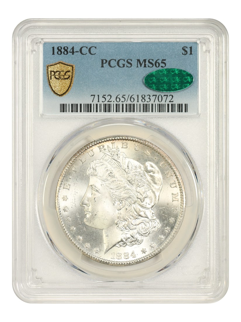 1884 Carson City Morgan Silver Dollar PCGS CAC MS65 $1 Coin: 1884 Carson City Morgan Silver Dollar PCGS CAC MS65 $1 Coin 1884-CC Morgan Dollar certified by PCGS and CAC in MS65 grade. This uncirculated Carson City issue is noted as one of the more common CC-Min