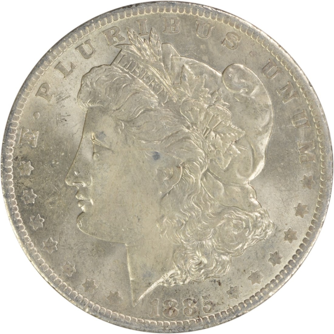 Uncirculated 1885 O Silver Dollar Morgan BU Uncertified US Coin: Uncirculated 1885 O Silver Dollar Morgan BU Uncertified US Coin This is an uncirculated 1885-O Morgan Silver Dollar from the United States. The coin is composed of silver and has a Brilliant Uncircula