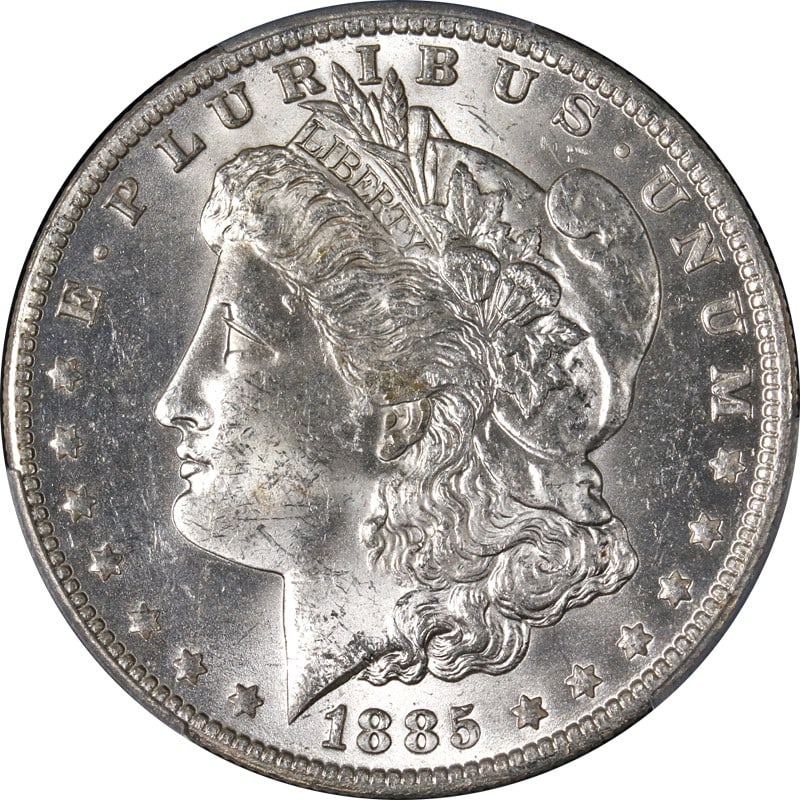 PCGS MS63 1885-O Morgan Dollar Uncirculated Silver Coin: PCGS MS63 1885-O Morgan Dollar Uncirculated Silver Coin This 1885-O Morgan Silver Dollar is certified by PCGS with a grade of MS63. The coin is uncirculated, exhibiting great eye appeal, exceptional l