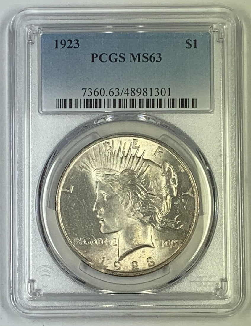 PCGS MS 63 1923 Peace Silver Dollar Certified Uncirculated Coin: PCGS MS 63 1923 Peace Silver Dollar Certified Uncirculated Coin This 1923 Peace Silver Dollar is an uncirculated coin graded MS 63 by PCGS. Struck in silver, it features the iconic Peace design and is