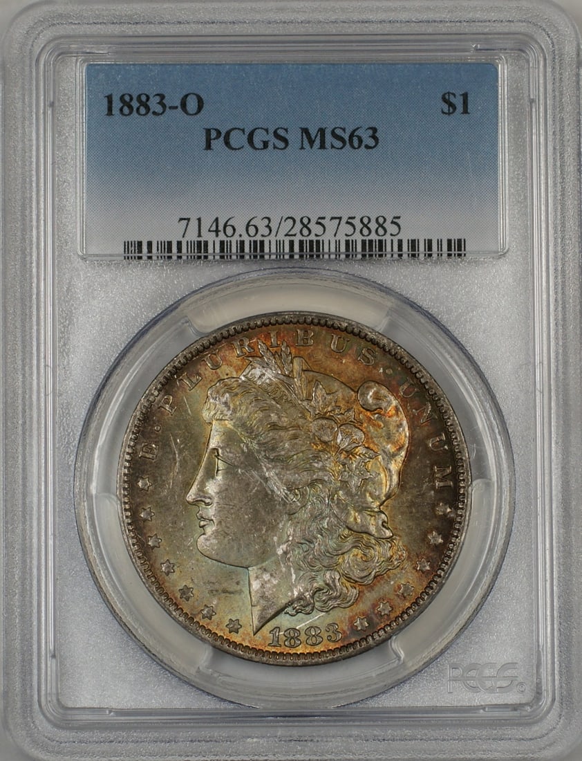 PCGS MS63 1883-O Morgan Dollar Silver Coin with Attractive Toning: PCGS MS63 1883-O Morgan Dollar Silver Coin with Attractive Toning This 1883-O Morgan Silver Dollar is a beautifully toned coin certified by PCGS with a grade of MS 63. Minted in New Orleans in 1883, t