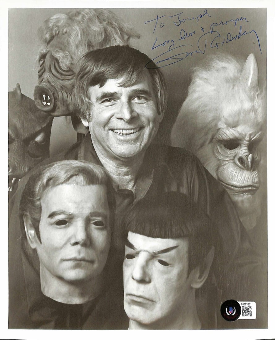 Gene Roddenberry RARE Signed 8x10 Star Trek Photo Beckett Certified: Gene Roddenberry RARE Signed 8x10 Star Trek Photo Beckett Certified This remarkable item features an autographed 8x10 photograph of Gene Roddenberry, the visionary creator of Star Trek. Signed in blue