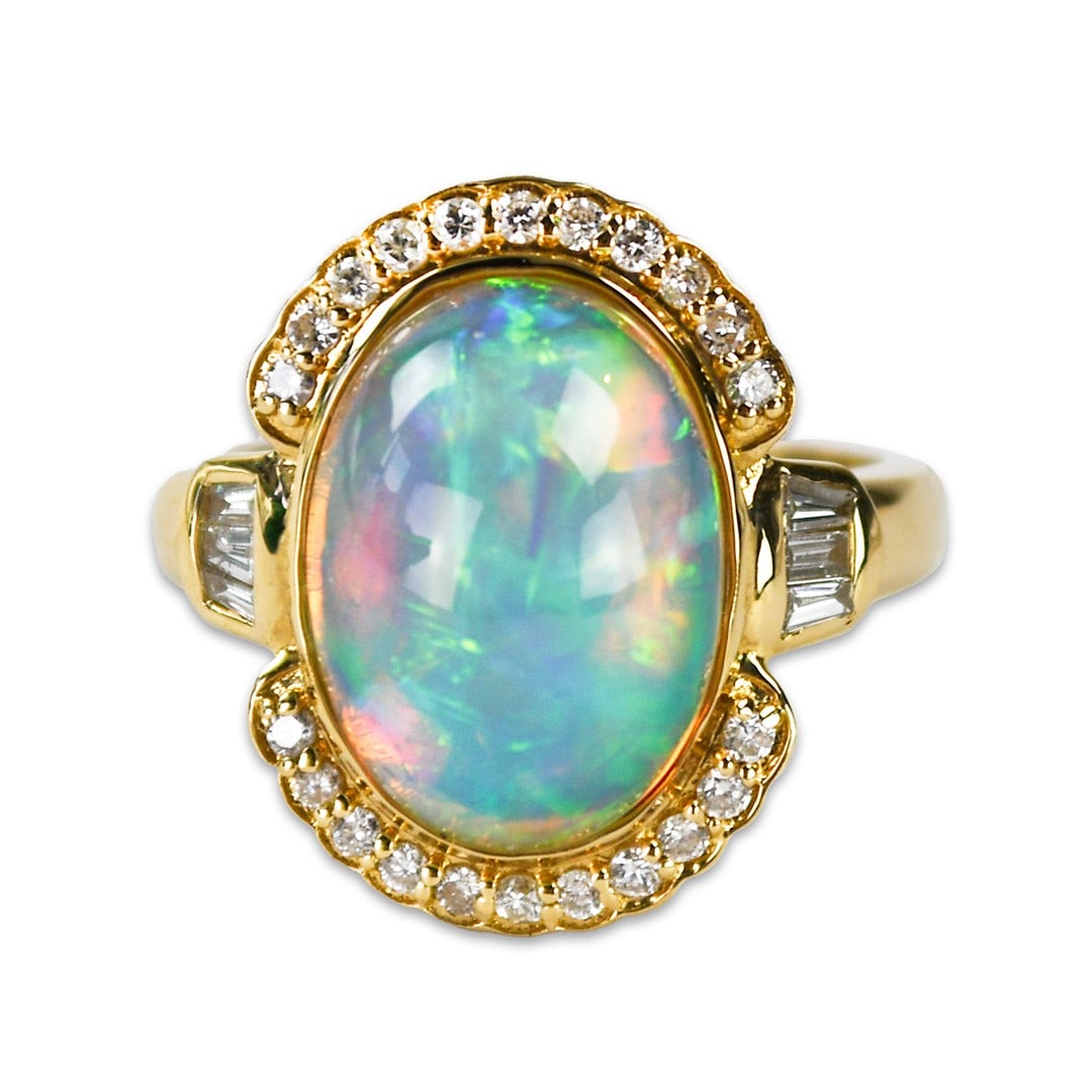 Cocktail Ring 14K Yellow Gold Australian Opal and Diamond Size 6.5: Cocktail Ring 14K Yellow Gold Australian Opal and Diamond Size 6.5 Ladies' cocktail ring featuring a natural Australian crystal opal with blue, green, and red play of color, accented by round brillian