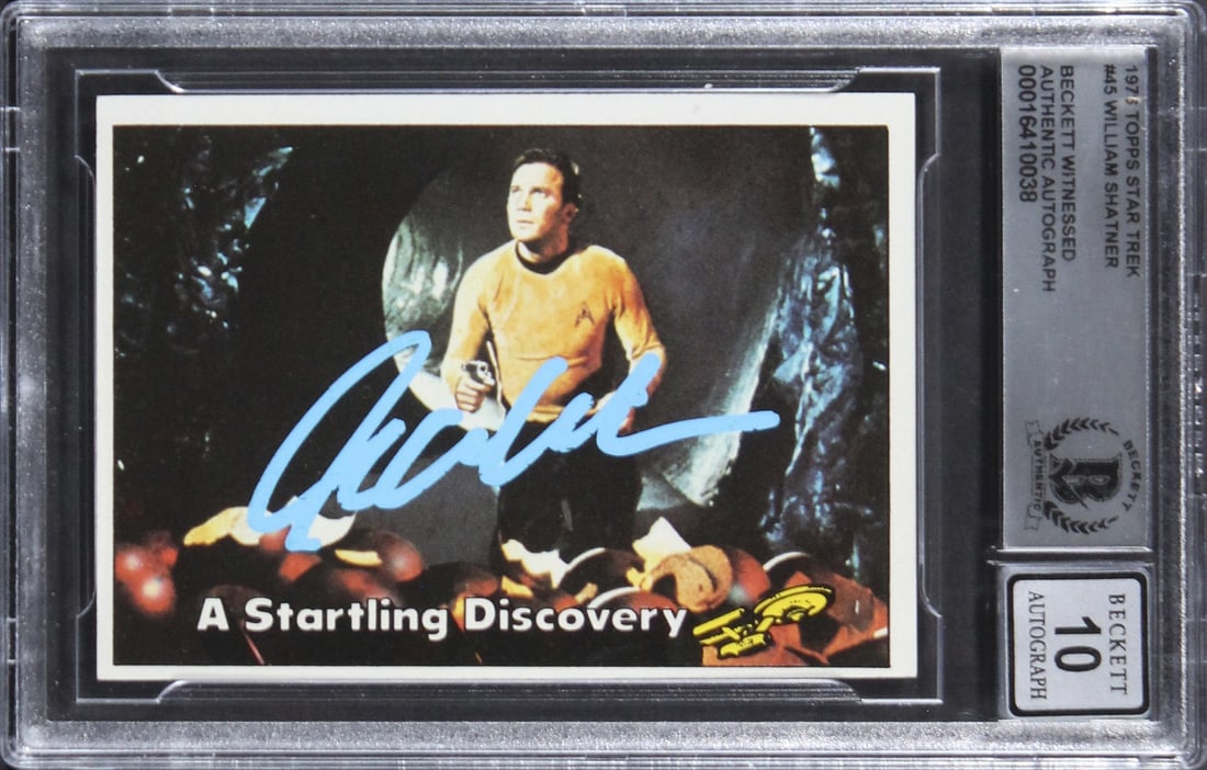 1976 Topps #45 Card Signed by William Shatner Beckett Gem Mint 10 Slabbed: 1976 Topps #45 Card Signed by William Shatner Beckett Gem Mint 10 Slabbed This original 1976 Topps Star Trek #45 trading card has been hand-signed by William Shatner. The card has been professionally 