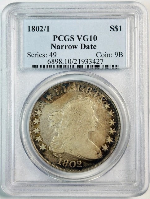 PCGS VG-10 1802 over 1 Draped Bust Silver Dollar Narrow Date: PCGS VG-10 1802 over 1 Draped Bust Silver Dollar Narrow Date Pre-owned 1802/1 Draped Bust silver dollar certified by PCGS and graded VG-10. This coin features the Narrow Date variety and has a denomin