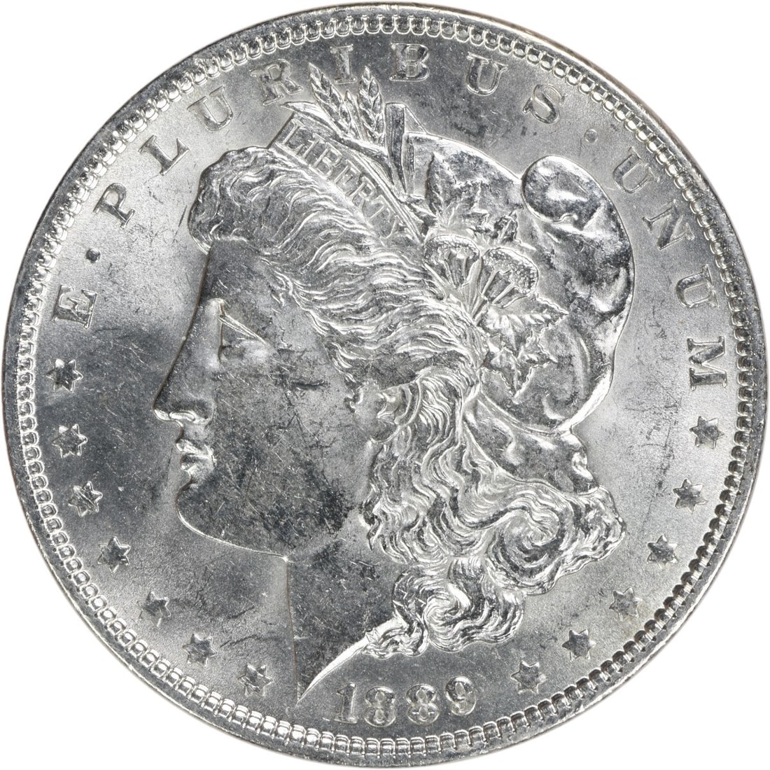 Uncirculated 1889 Silver Morgan Dollar BU Grade No Mint Mark: Uncirculated 1889 Silver Morgan Dollar BU Grade No Mint Mark This is an 1889 Morgan Silver Dollar from the United States. The coin is composed of silver, has no mint mark, and is in Brilliant Uncircul