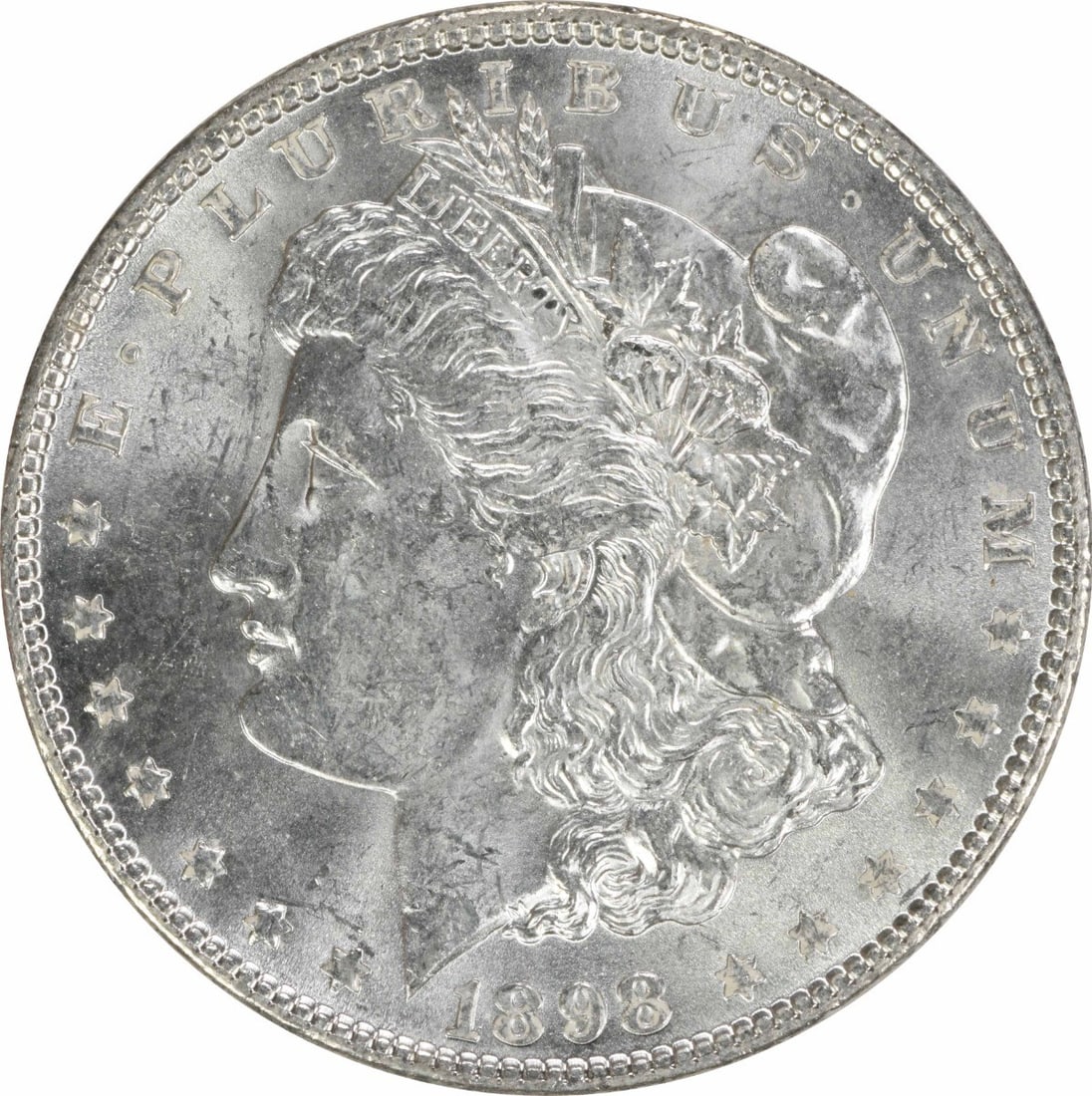 Choice BU 1898 Morgan Silver Dollar Uncirculated Philadelphia Mint: Choice BU 1898 Morgan Silver Dollar Uncirculated Philadelphia Mint This is an uncirculated 1898 Morgan Silver Dollar from the United States, featuring a silver composition and a Choice BU grade. The c