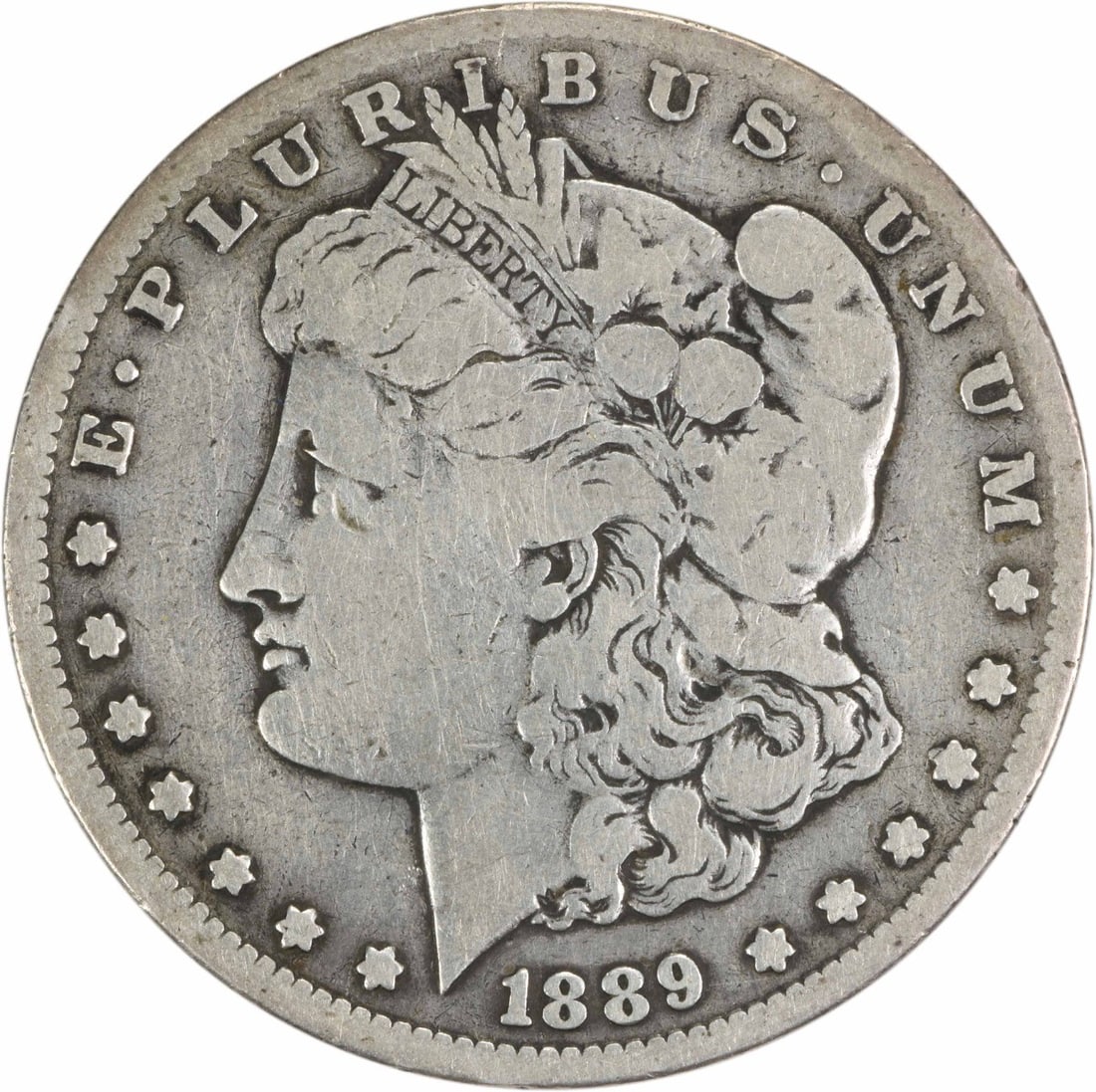 1889-CC Morgan Silver Dollar $1 VG Uncertified Coin by George T. Morgan: 1889-CC Morgan Silver Dollar $1 VG Uncertified Coin by George T. Morgan This 1889-CC Morgan Silver Dollar is a beautiful representation of American coinage. Designed by George T. Morgan, this coin fea