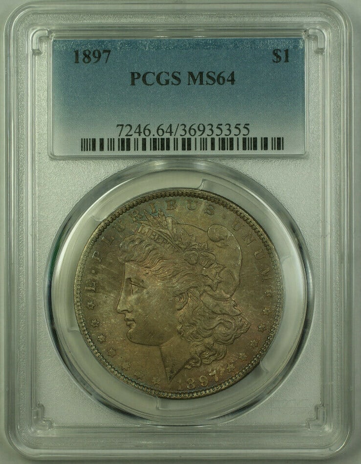 1897 $1 Morgan Dollar Silver PCGS MS64 Toned Obverse Philadelphia: 1897 $1 Morgan Dollar Silver PCGS MS64 Toned Obverse Philadelphia This 1897 Morgan Silver Dollar features a $1 denomination and is certified by PCGS with a grade of MS-64. The coin is composed of 90% 