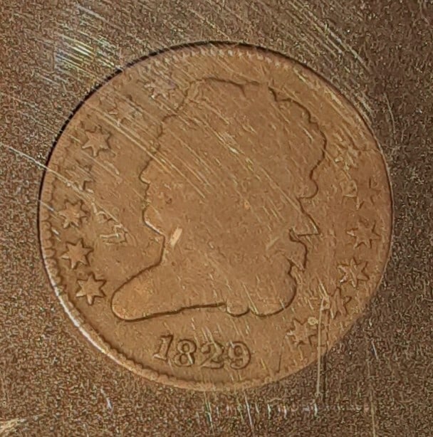 1829 United States Classic Head Copper Half Cent Philadelphia Mint: 1829 United States Classic Head Copper Half Cent Philadelphia Mint This is an 1829 Classic Head Half Cent from the United States, featuring a copper composition and a brown (BN) color. The coin is fro