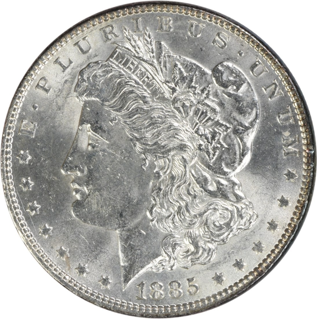 Brilliant Uncirculated 1885 Silver Morgan Dollar No Mint Mark Uncertified: Brilliant Uncirculated 1885 Silver Morgan Dollar No Mint Mark Uncertified This is an uncirculated 1885 Morgan silver dollar graded as Brilliant Uncirculated (BU). The coin is uncertified and features 