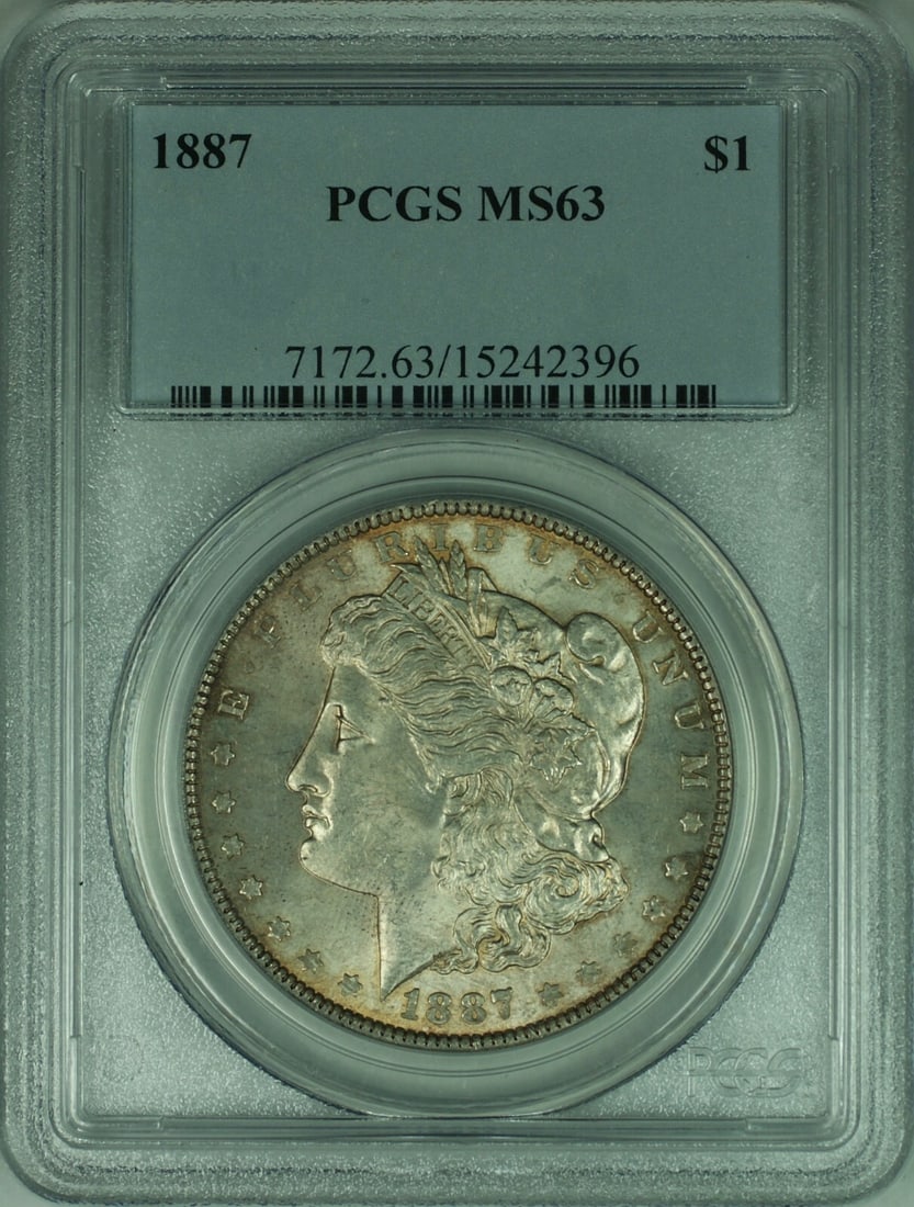 PCGS MS63 1887 Morgan Dollar Silver Toned: PCGS MS63 1887 Morgan Dollar Silver Toned This is a 1887 Morgan Silver Dollar coin from the United States, featuring a $1 denomination. The coin is composed of silver and has been graded MS63 by PCGS,