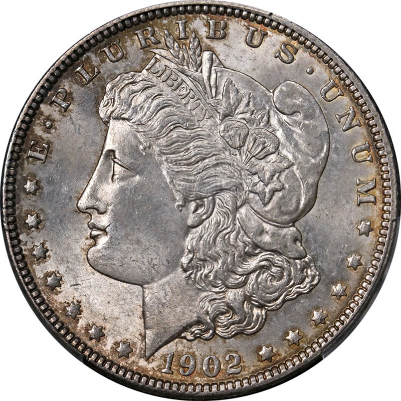 PCGS MS63 1902 Philadelphia Morgan Dollar Uncirculated Silver Coin: PCGS MS63 1902 Philadelphia Morgan Dollar Uncirculated Silver Coin This original 1902-P Morgan Silver Dollar, minted in Philadelphia, is certified by PCGS with a grade of MS63. The coin features nice 