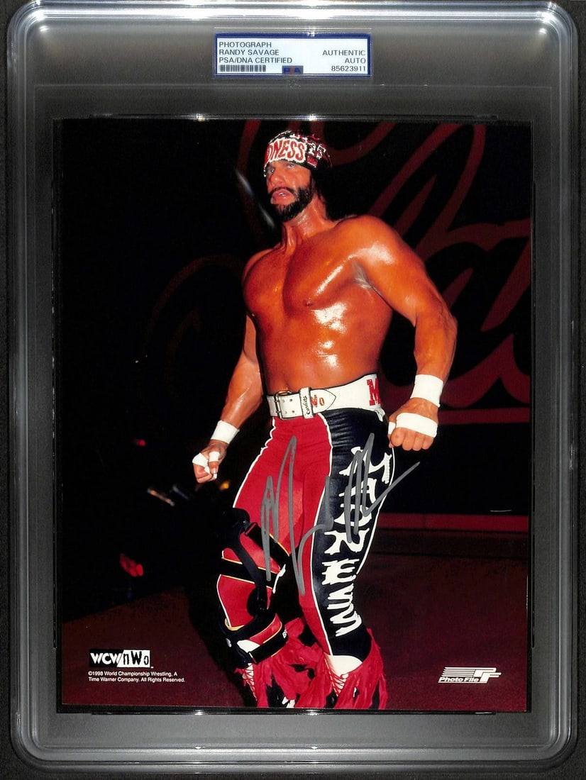 PSA DNA Randy Savage autographed 8x10 WCW nWo photo: PSA DNA Randy Savage autographed 8x10 WCW nWo photo This is a hand-signed 8x10 color photograph of Randy "Macho Man" Savage in his WCW/nWo "Madness" attire. The autograph is boldly rendered in silver 