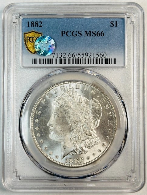 PCGS MS66 1882 Morgan Silver Dollar Sight White: PCGS MS66 1882 Morgan Silver Dollar Sight White 1882 Morgan Silver Dollar graded MS 66 by PCGS. This pre-owned coin is described as Sight White and has a silver composition. Specifications Coin Type: 
