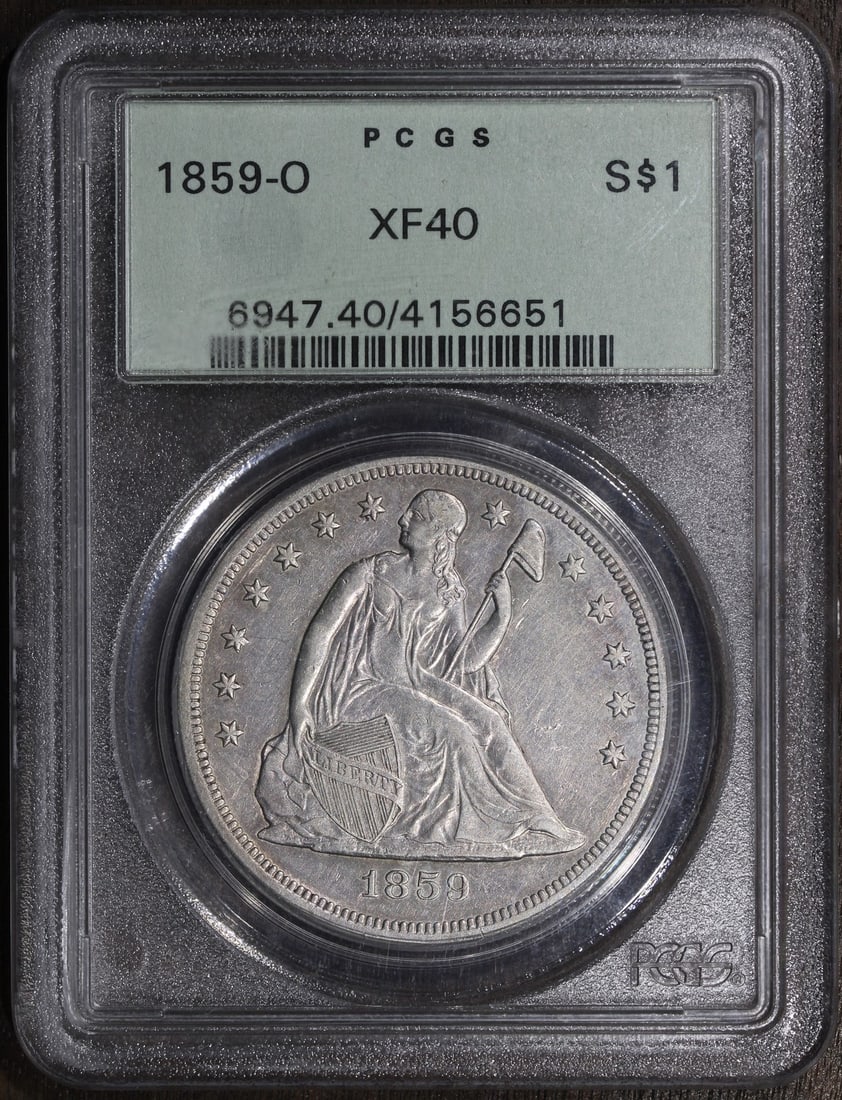 PCGS XF40 1859-O Seated Liberty Silver Dollar No Motto: PCGS XF40 1859-O Seated Liberty Silver Dollar No Motto This is an 1859 Seated Liberty Dollar, graded XF40 by PCGS and housed in an Old Green Holder (OGH). Minted in New Orleans, this circulated silver
