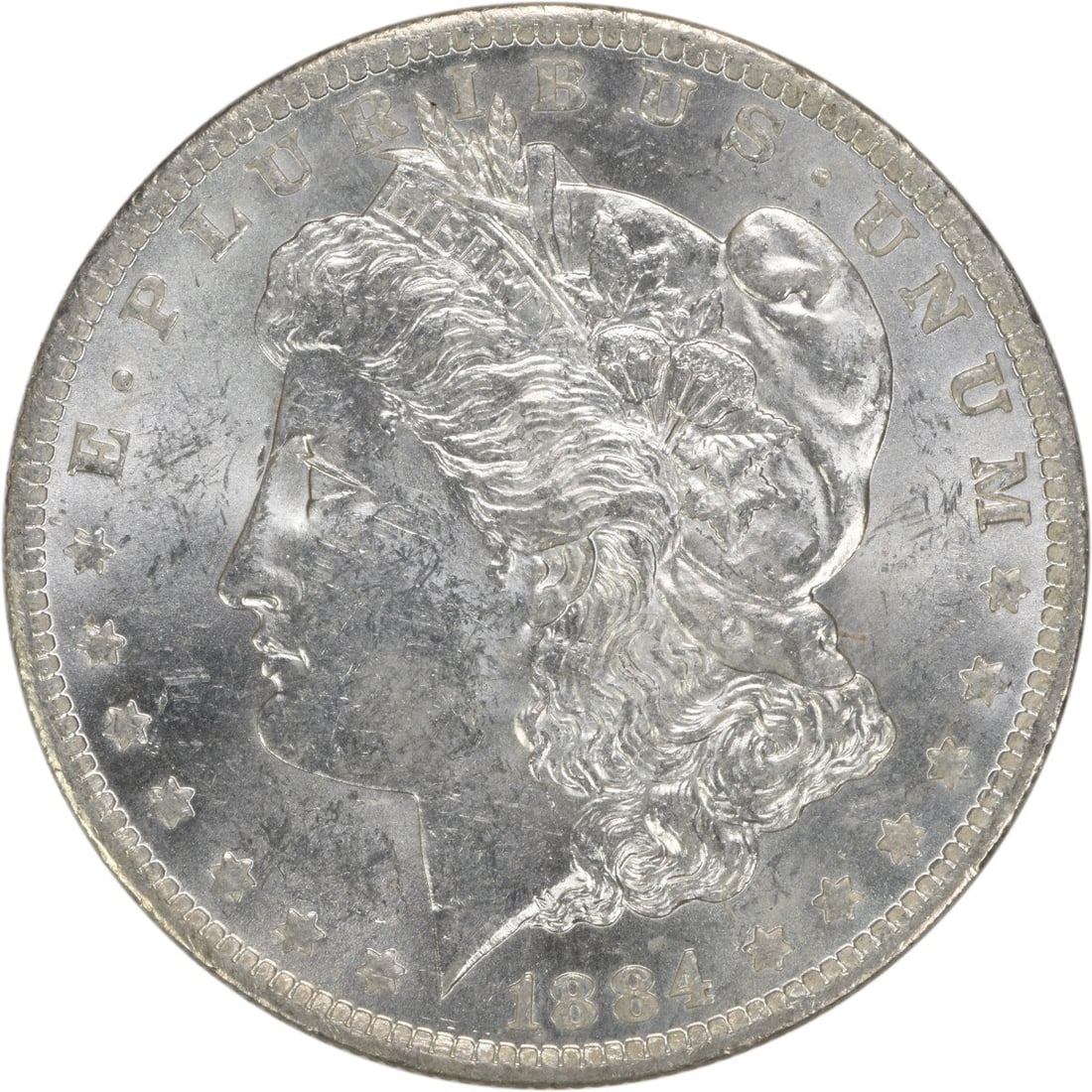 Uncirculated 1884-O Morgan Dollar Brilliant Silver Coin Uncertified: Uncirculated 1884-O Morgan Dollar Brilliant Silver Coin Uncertified This is an uncirculated 1884-O Morgan Silver Dollar from the United States, featuring brilliant uncirculated (BU) grade quality. The