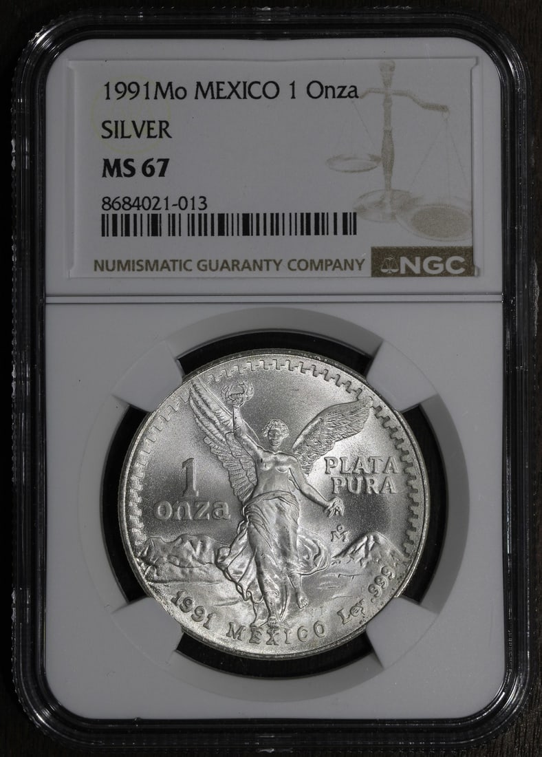 1991 Mexico Silver Libertad 1 oz NGC MS67: 1991 Mexico Silver Libertad 1 oz NGC MS67 This 1991 Mexican Libertad 1 oz silver coin features a fineness of 0.999 and has been graded MS 67 by NGC. Minted by the Mexican Mint, this pre-owned coin is 