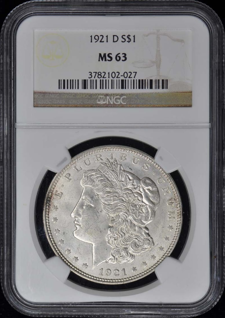 1921-D Morgan Silver Dollar NGC MS63 Uncirculated Coin: 1921-D Morgan Silver Dollar NGC MS63 Uncirculated Coin This 1921-D Morgan Dollar is a remarkable coin that has been certified by NGC with a grade of MS63, indicating its uncirculated condition. Minted