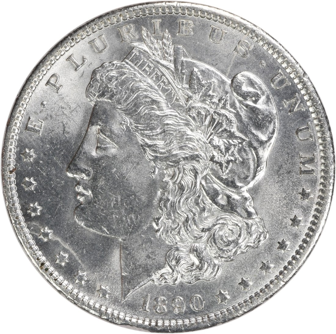 Brilliant Uncirculated 1890 Silver Dollar Morgan Series Uncertified: Brilliant Uncirculated 1890 Silver Dollar Morgan Series Uncertified This 1890 Morgan Silver Dollar is in brilliant uncirculated condition and remains uncertified. It is composed of silver and features