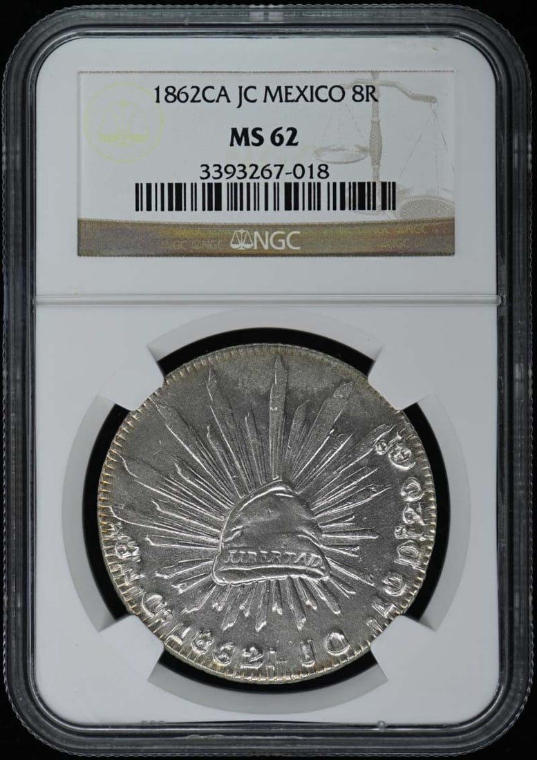 1862 Mexico 8 Reales Coin NGC MS62 Certified: 1862 Mexico 8 Reales Coin NGC MS62 Certified This 1862 Mexico 8 Reales coin is graded MS62 by NGC, indicating it is in uncirculated condition with minimal wear. The coin showcases the historical signi