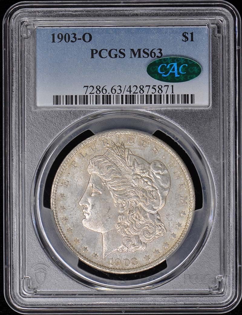 PCGS MS63 CAC 1903-O Morgan Dollar: PCGS MS63 CAC 1903-O Morgan Dollar This is a 1903-O Morgan Dollar graded MS63 by PCGS and approved by CAC. The coin is uncirculated and was minted in New Orleans. It features the classic Liberty head 