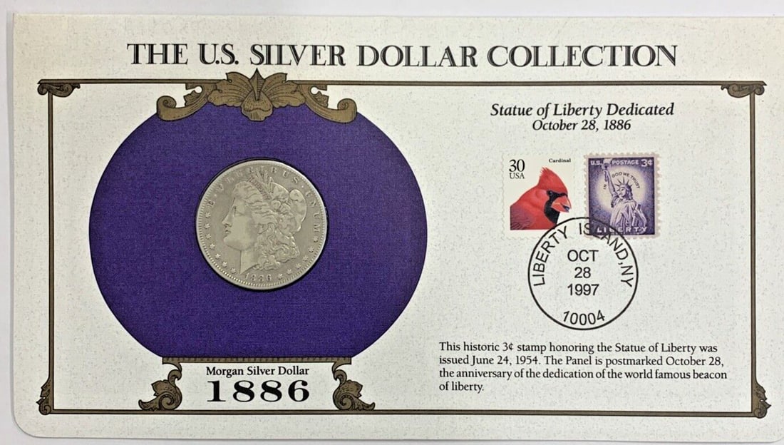 1886-O Morgan Silver Dollar with Commemorative Stamp Card: 1886-O Morgan Silver Dollar with Commemorative Stamp Card This 1886-O Morgan Silver Dollar is a circulated $1 coin from the United States, minted in New Orleans. It is part of a coin collection that i
