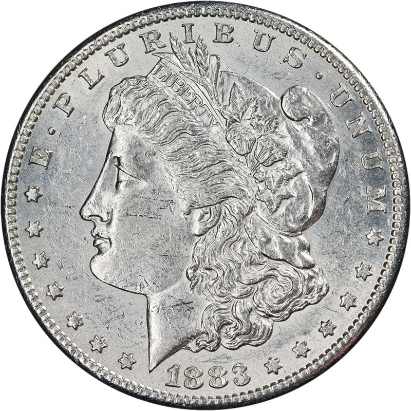 1883 San Francisco Mint Morgan Dollar Silver Coin AU or BU Grade: 1883 San Francisco Mint Morgan Dollar Silver Coin AU or BU Grade This 1883-S Morgan Silver Dollar offers great eye appeal with a bright white color, nice luster, and a strong strike. The coin features