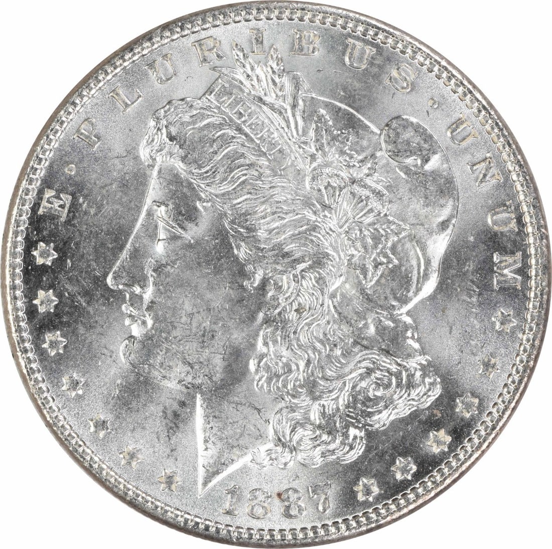 1887 Uncirculated Morgan Silver Dollar $1 Uncertified: 1887 Uncirculated Morgan Silver Dollar $1 Uncertified 1887 Morgan Silver Dollar in uncirculated, pre-owned condition. This uncertified silver $1 coin is identified as KM Number 110 and is listed with 