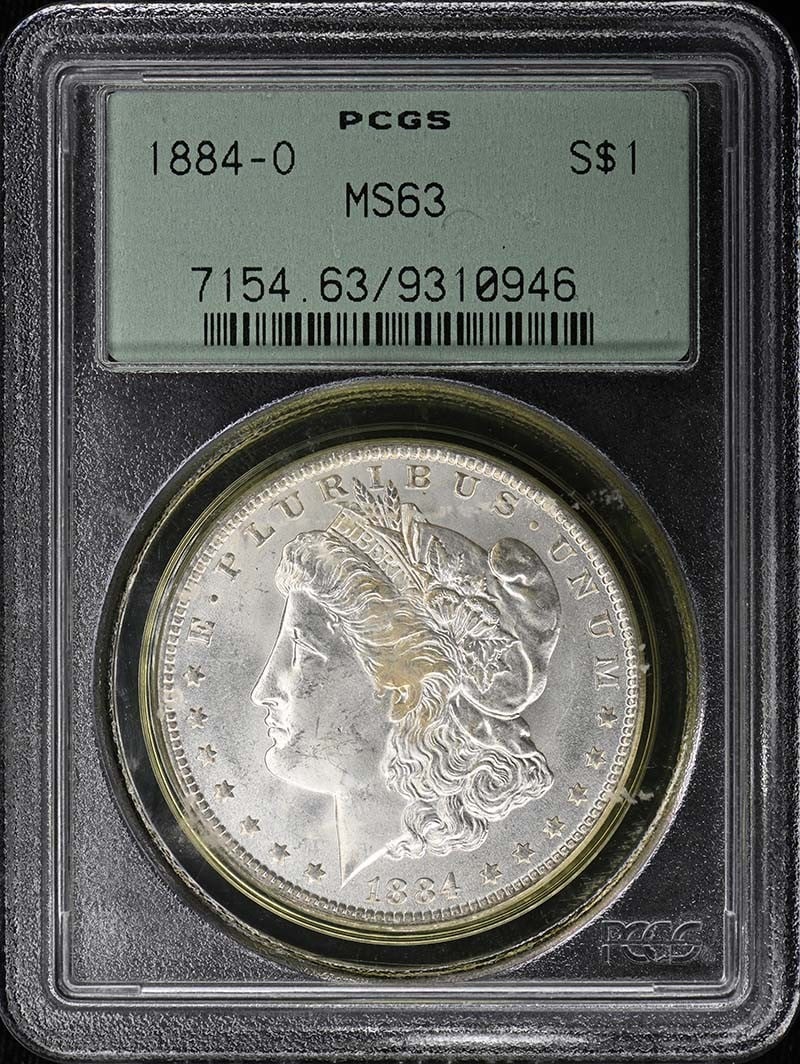 PCGS MS63 1884 O Morgan Silver Dollar: PCGS MS63 1884 O Morgan Silver Dollar 1884-O Morgan Dollar certified by PCGS and graded MS63. This pre-owned coin is an uncirculated United States silver dollar from the Morgan Dollar series. Specific