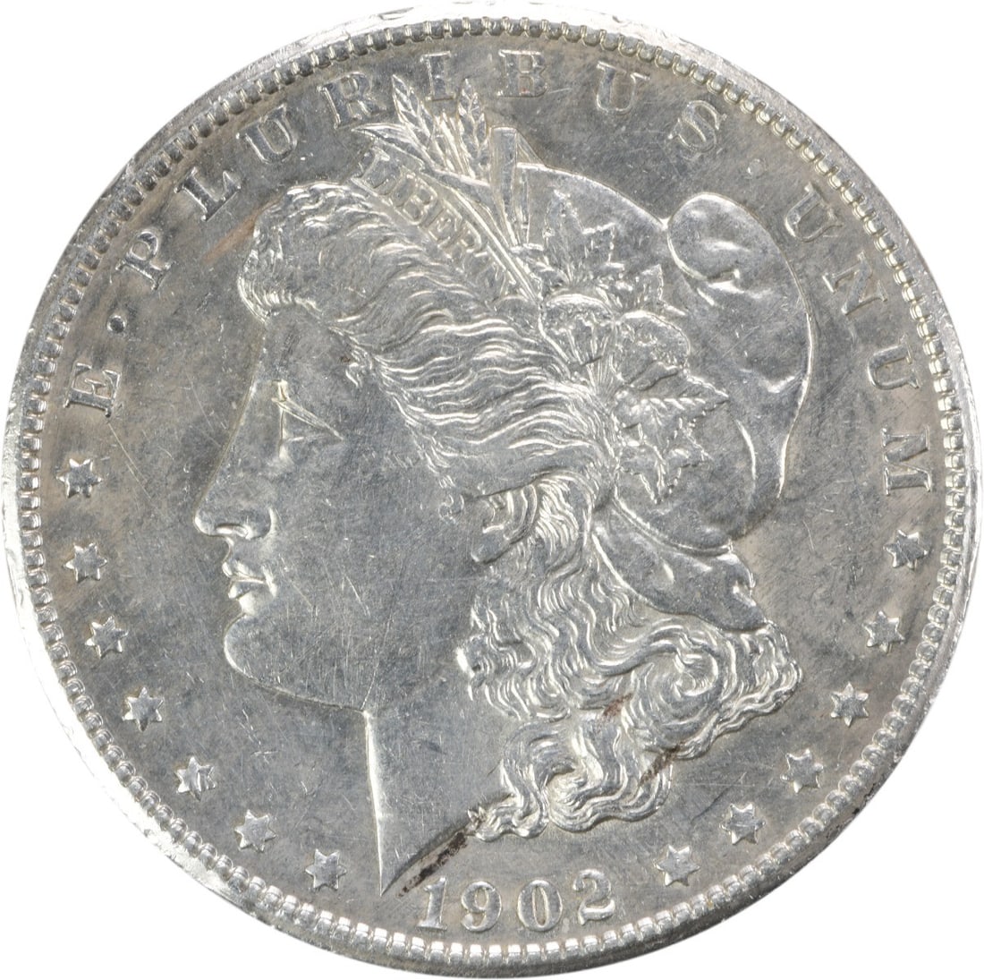 1902 San Francisco Morgan Dollar AU Grade 90 Percent Silver Uncertified Coin: 1902 San Francisco Morgan Dollar AU Grade 90 Percent Silver Uncertified Coin This 1902-S Morgan Silver Dollar is an uncertified example graded as About Uncirculated (AU), featuring a composition of 90
