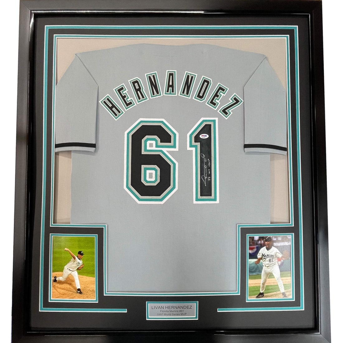 Framed Livan Hernandez autographed grey jersey PSA COA 33x42: Framed Livan Hernandez autographed grey jersey PSA COA 33x42 This is a professionally framed and matted grey Miami Marlins jersey autographed by Livan Hernandez, the 1997 World Series MVP. The display
