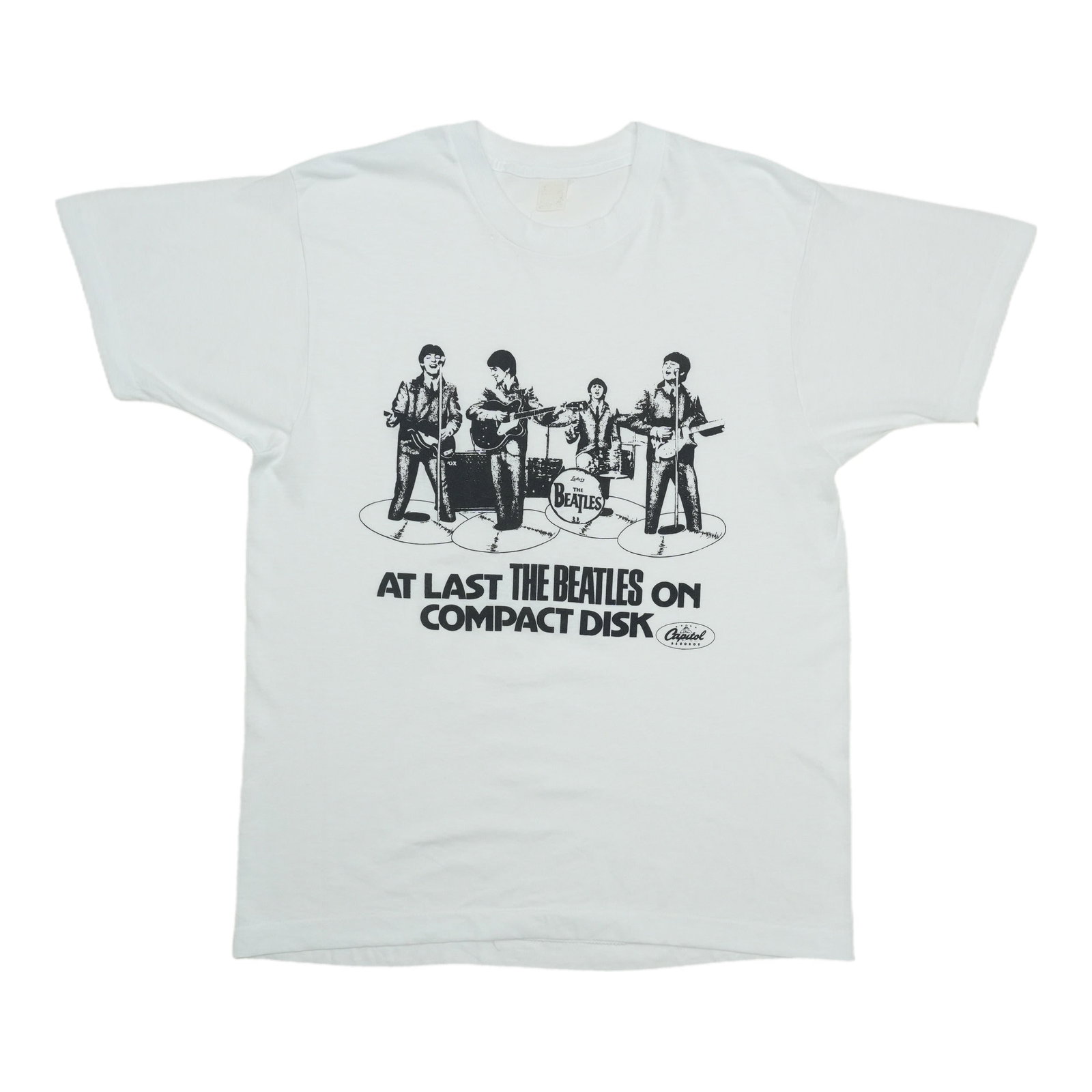 Vintage 1987 Beatles Capitol Records white shirt Large: Vintage 1987 Beatles Capitol Records white shirt Large This is an original vintage 1987 "The Beatles On Compact Disk" shirt produced by Capitol Records. The shirt is not a modern reproduction and rema