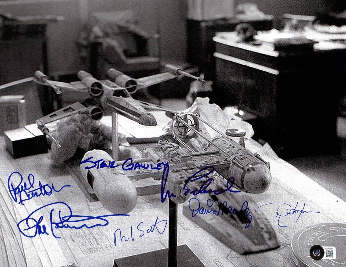 Rare Signed 11x14 ILM Star Wars Photo by 7 Model Makers Beckett Authenticated: Rare Signed 11x14 ILM Star Wars Photo by 7 Model Makers Beckett Authenticated This unique 11x14 black & white photograph is a rare piece of Star Wars history, hand-signed by seven esteemed members of 