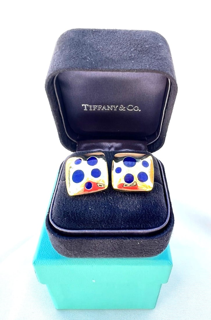 Tiffany & Co 14K Yellow Gold Enameled Stud Earrings with Original Boxes: Tiffany & Co 14K Yellow Gold Enameled Stud Earrings with Original Boxes This exquisite pair of earrings from Tiffany & Co. showcases a stunning enameled design crafted in 14K yellow gold. Each stud ea